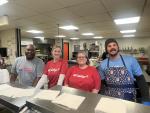 WK employees serving lunch at the Salvation Army 